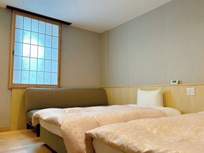 Twin bed + extra bed