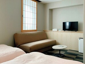 Twin bed + extra bed