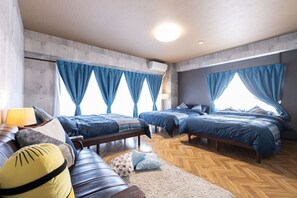 [Bedroom 1] 3 double beds (room for 3 to 6 people)