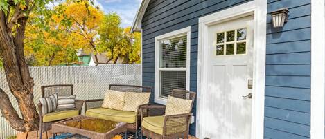Spacious deck with comfortable seating at Cozy Great Falls Retreat by Wrecked & Refined – perfect for unwinding after a day of exploring Great Falls.