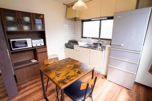 There are two chairs available at the dining table!