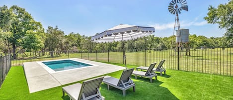 Amazing and fully fenced pool area with turf. Heated-capable pool.