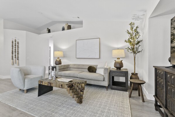 Chic, cozy living room: Your retreat for relaxation & memorable moments awaits!