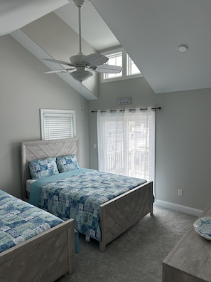 Master Bedroom 2 Queen Beds, 60 inch Smart TV and a Master Bath