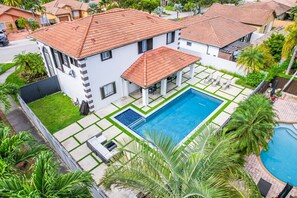 Overview of the backyard and pool area.