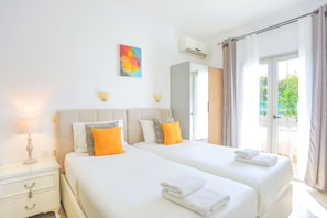 Contemporary and comfortable twin bedroom