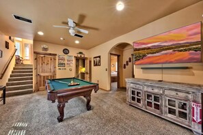 2nd of 3 living areas, with higher end pool table, large HDTV and all streaming.