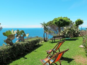 Property, Lawn, Grass, Azure, Vacation, Botany, Sea, Tourism, Real Estate, Summer