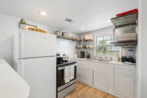 Whip up delicious meals in this charming kitchen