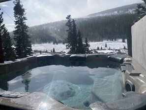 Steps from the entry door, sink into the hot tub for a long soak.