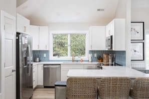 Fully Stocked Kitchen with Breakfast Seating