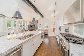 Kitchen - Fully equipped kitchen with two ovens and two stoves.