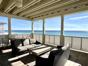 GRAND PORCH W/LOUNGE SEATING & OUTDOOR DINING
