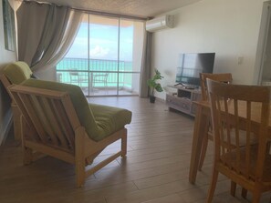 View of the living room and ocean.