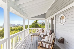 UPPER-LEVEL DECK WITH GREAT OUTDOOR SPACE AND WATER VIEWS