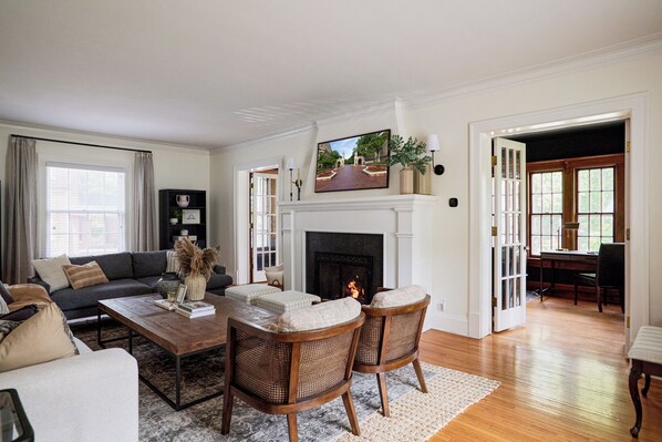 Primary living room with working gas fireplace.