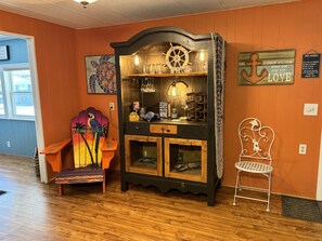 Wine Cabinet and MargaritaVille chair