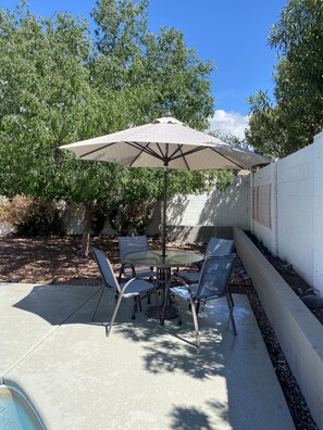 Patio table/chairs with umbrella