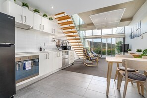 Experience the best of both worlds with a thoughtfully designed kitchen and dining space that’s perfect for creating and sharing meals.Experience the best of both worlds with a thoughtfully designed kitchen and dining space that’s perfect for creating and