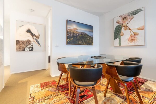 Enjoy meals in our dining table room, designed for comfort and style. Featuring a spacious dining table and elegant decor, this room offers a welcoming atmosphere for sharing delicious meals and creating memorable moments.
