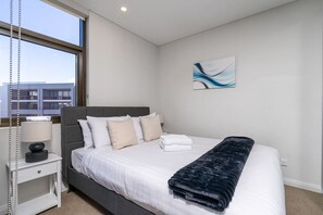 Indulge in a restful night's sleep in our cosy bedroom, featuring professionally laundered linens for your ultimate comfort.