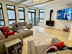 Living area with 75" SmartTV & Gas fireplace