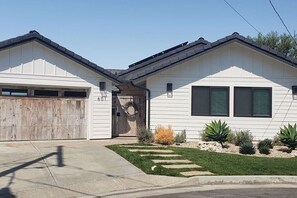 Front of house. Apartment on right with private entrance.