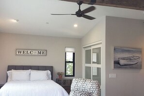 Large open concept living space. Ocean View from window pictured.