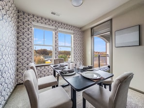 Dining Room that seats 6, with 3 additional seats on the stool at the Kitchen countertop