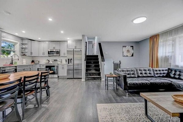 Kitchen , living room and stairs to bedrooms