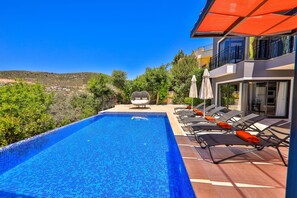 Splash into relaxation mode by the pool at this Turkish gem