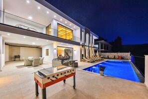 Captivating evening views of property and pool grounds