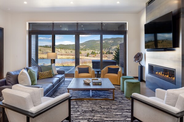 Mountain contemporary furnishings inside with breathtaking views from every room