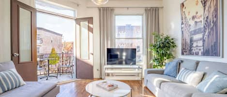 Open the doors for some fresh air & extend the space to the balcony