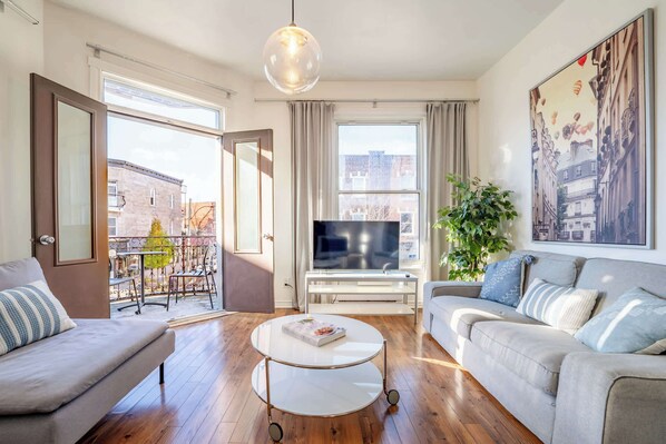 Open the doors for some fresh air & extend the space to the balcony