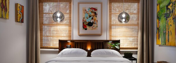 Amber pendant lights, & adjustable, massaging bed for a serene retreat.