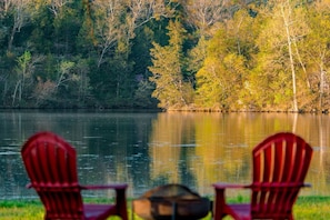 Community fire-pit by the lake. Pick up some wood at the local grocery story.