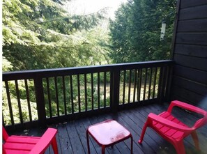 Private deck outside of master bedroom w/ river view. 