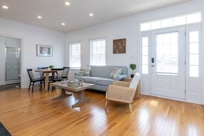 Open living and dining areas filled with natural light
