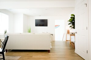 Entry stairs lead to living and dining area.