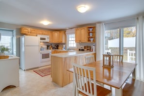 Kitchen & Dining Area | In-Unit Laundry | 2 Mi to Lighthouse Beach