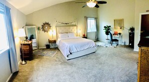 Primary bedroom 1 upstairs Queen bed, ceiling fan, vaulted ceiling, office space