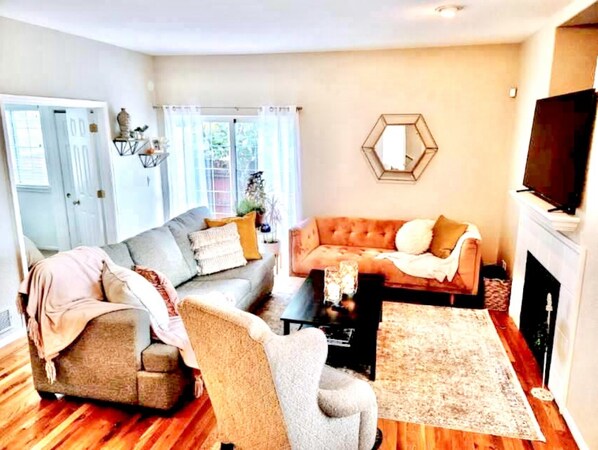 Living room, bedroom and back patio french doors (Main floor)