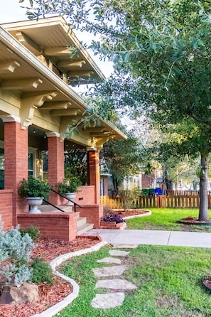 Front of house with path from private driveway to front porch