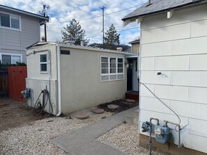 Walkway From the Front of the Property to the Back Where the Unit is Located