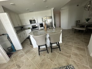 Kitchen area wirh chairs