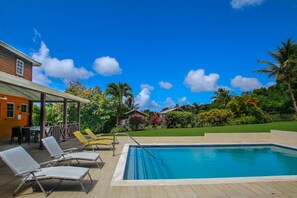 The pool deck with loungers