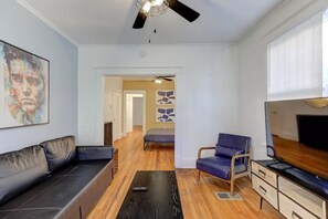 Relax in sophistication: Enter our welcoming living space, seamlessly blending comfort with contemporary elegance.