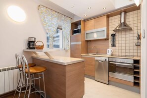 The kitchen's modern appliances make meal preparation easy.