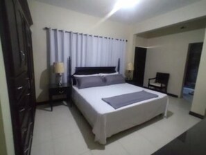  king size bed, private bathroom - rain shower & bathtub plus  mini fridge.